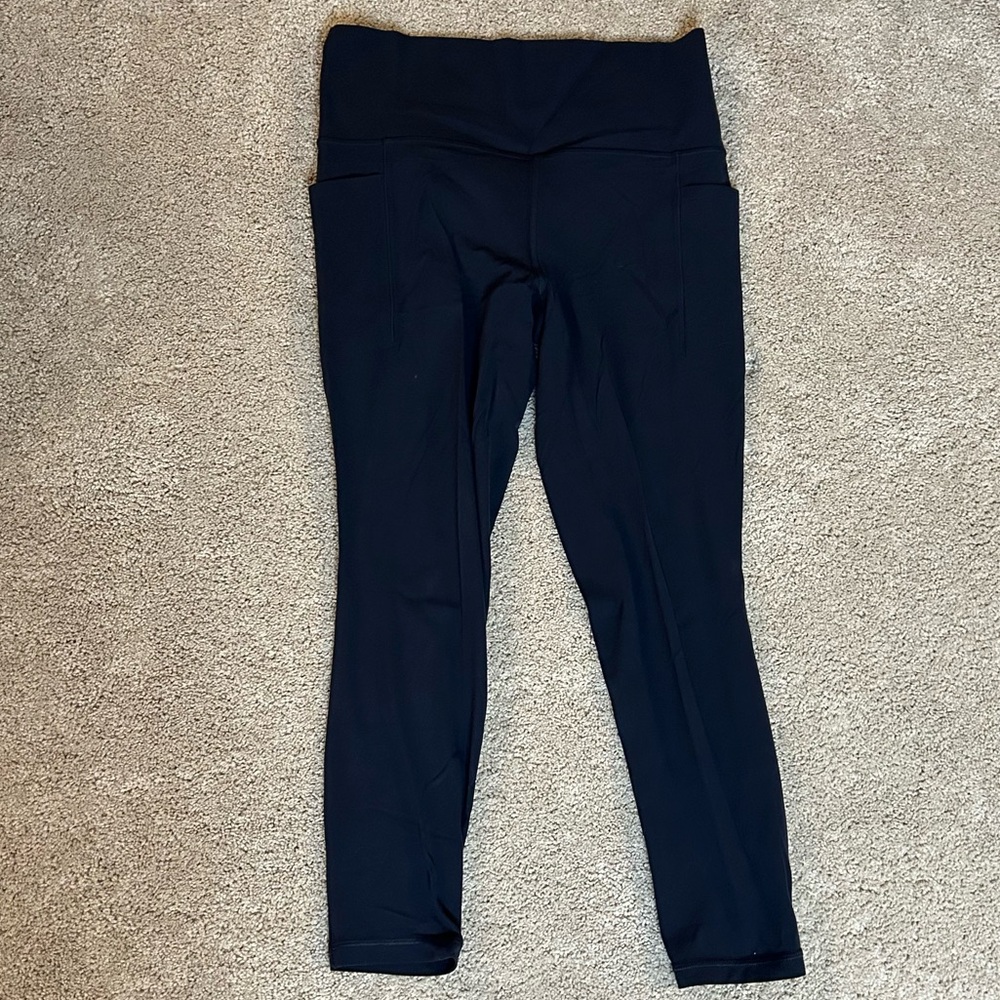 Athleta Salutation Stash Pocket 7/8 Tight